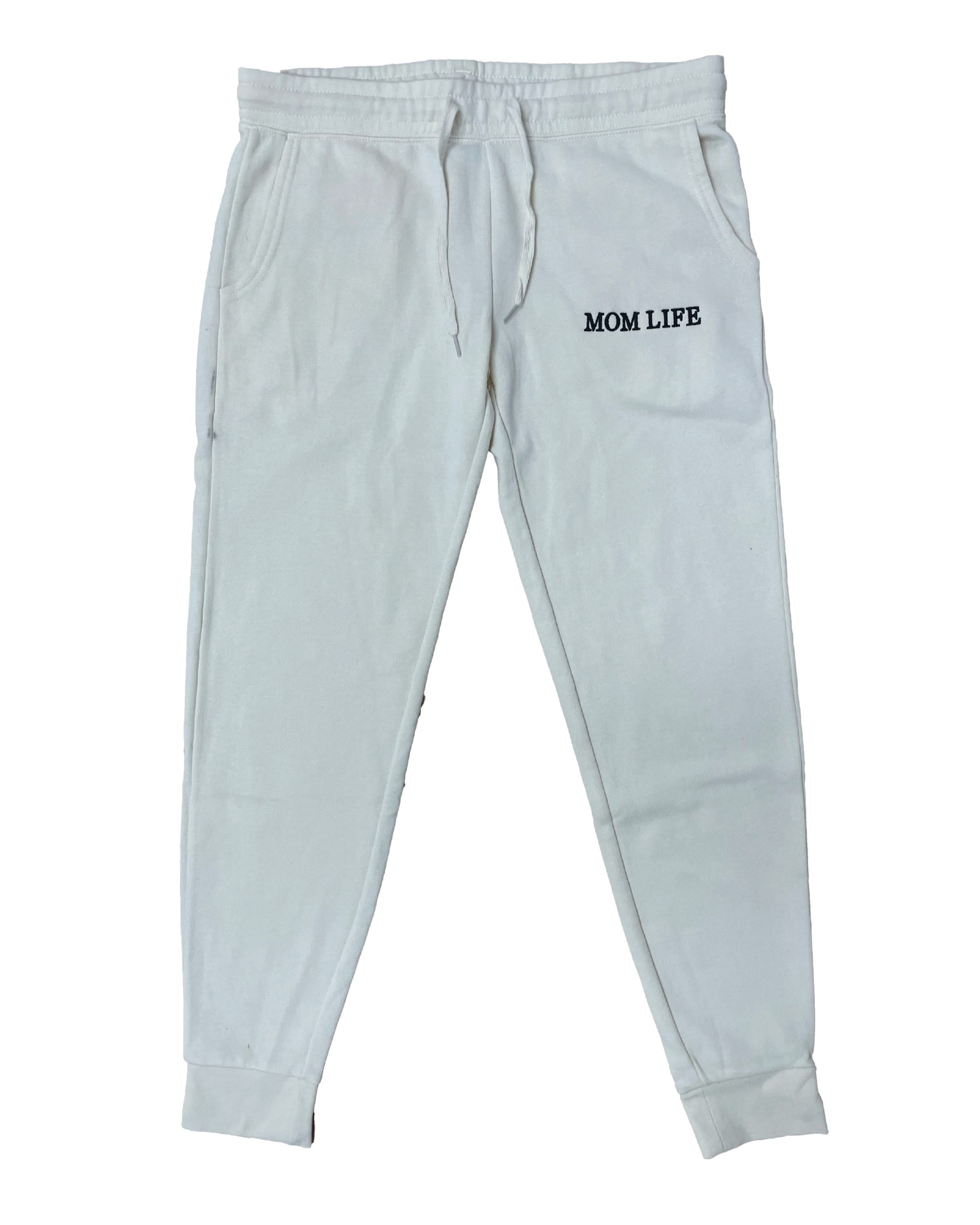 Joggers in bone with black 'Mom Life' graphic on flat lay - Little Mama Shirt Shop