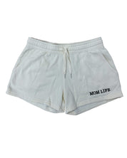 Shorts in bone with black embroidered  'Mom Life' graphic on flat lay - Little Mama Shirt Shop