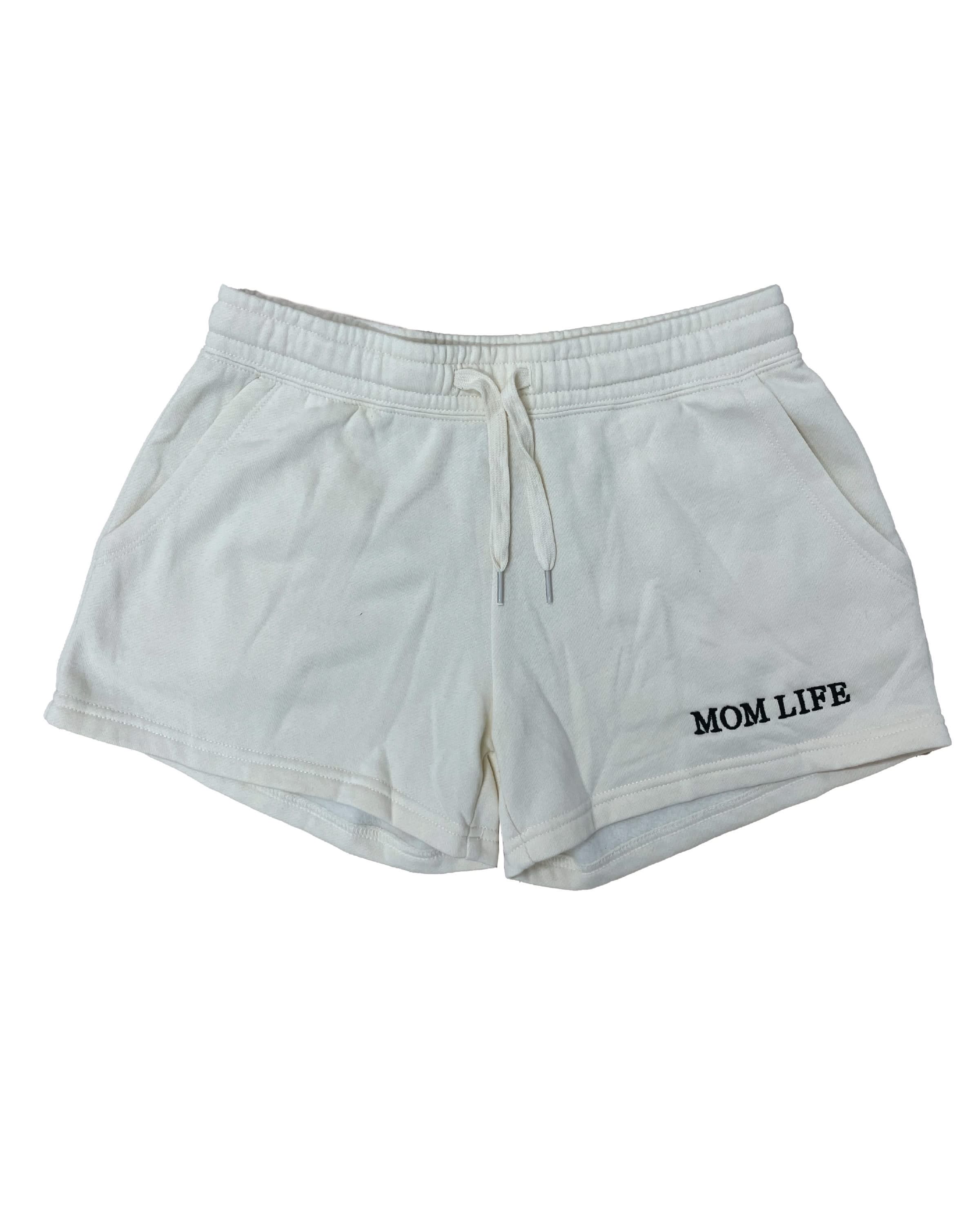 Shorts in bone with black embroidered  'Mom Life' graphic on flat lay - Little Mama Shirt Shop