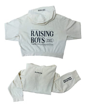 Hoodie front and back view in bone with black 'Raising Boys' graphic on flat lay - Little Mama Shirt Shop