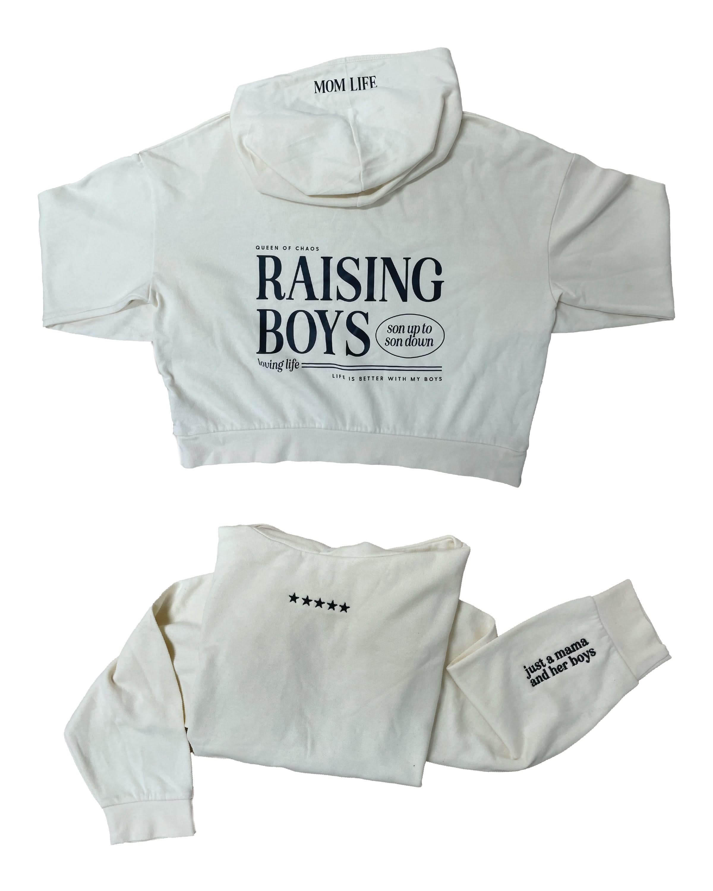 Hoodie front and back view in bone with black 'Raising Boys' graphic on flat lay - Little Mama Shirt Shop