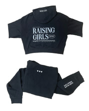 Hoodie front and back view in black with white 'Raising Girls' graphic on flat lay - Little Mama Shirt Shop