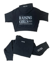 Hoodie front and back view in black with white 'Raising Girls' graphic on flat lay - Little Mama Shirt Shop