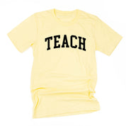 Teach (Varsity) - Unisex Tee Little Mama Shirt Shop