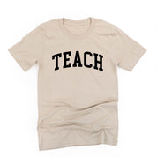 Teach (Varsity) - Unisex Tee Little Mama Shirt Shop