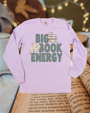 Comfort colors tee in orchid with 'Big Book Energy' graphic, shown on flat lay – Little Mama Shirt Shop