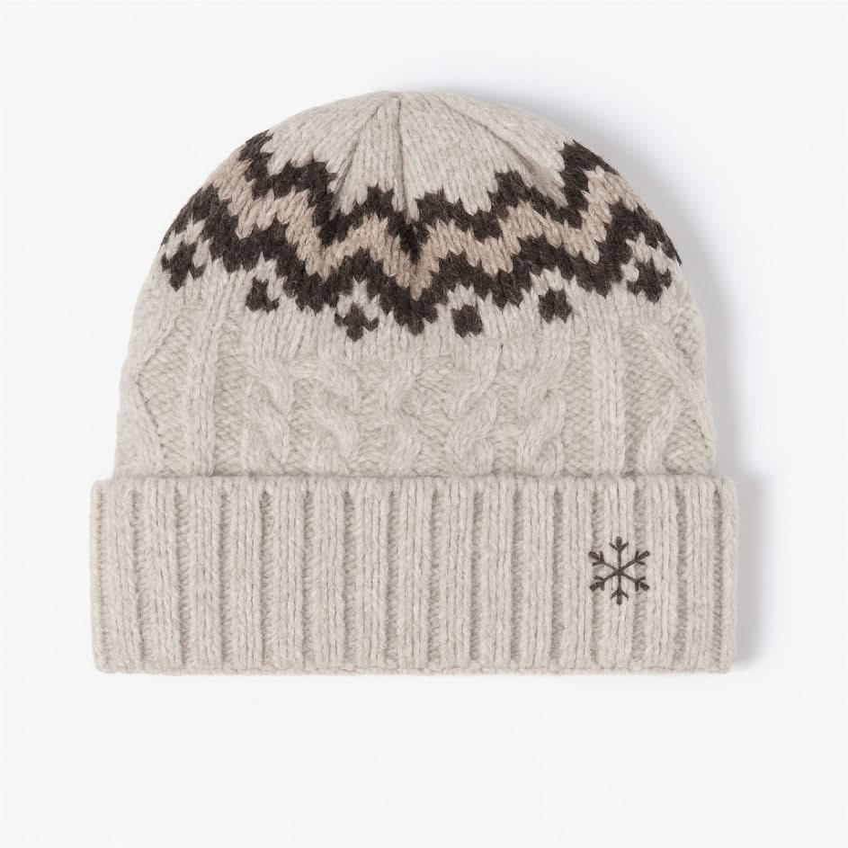 Adult beanie in cream with snowflake design on brim, shown on flat lay– Little Mama Shirt Shop