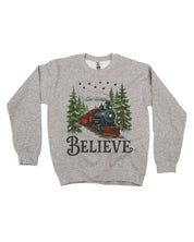 Adult Sweater in gray with winter train and 'Believe' on chest, shown on flat lay – Little Mama Shirt Shop