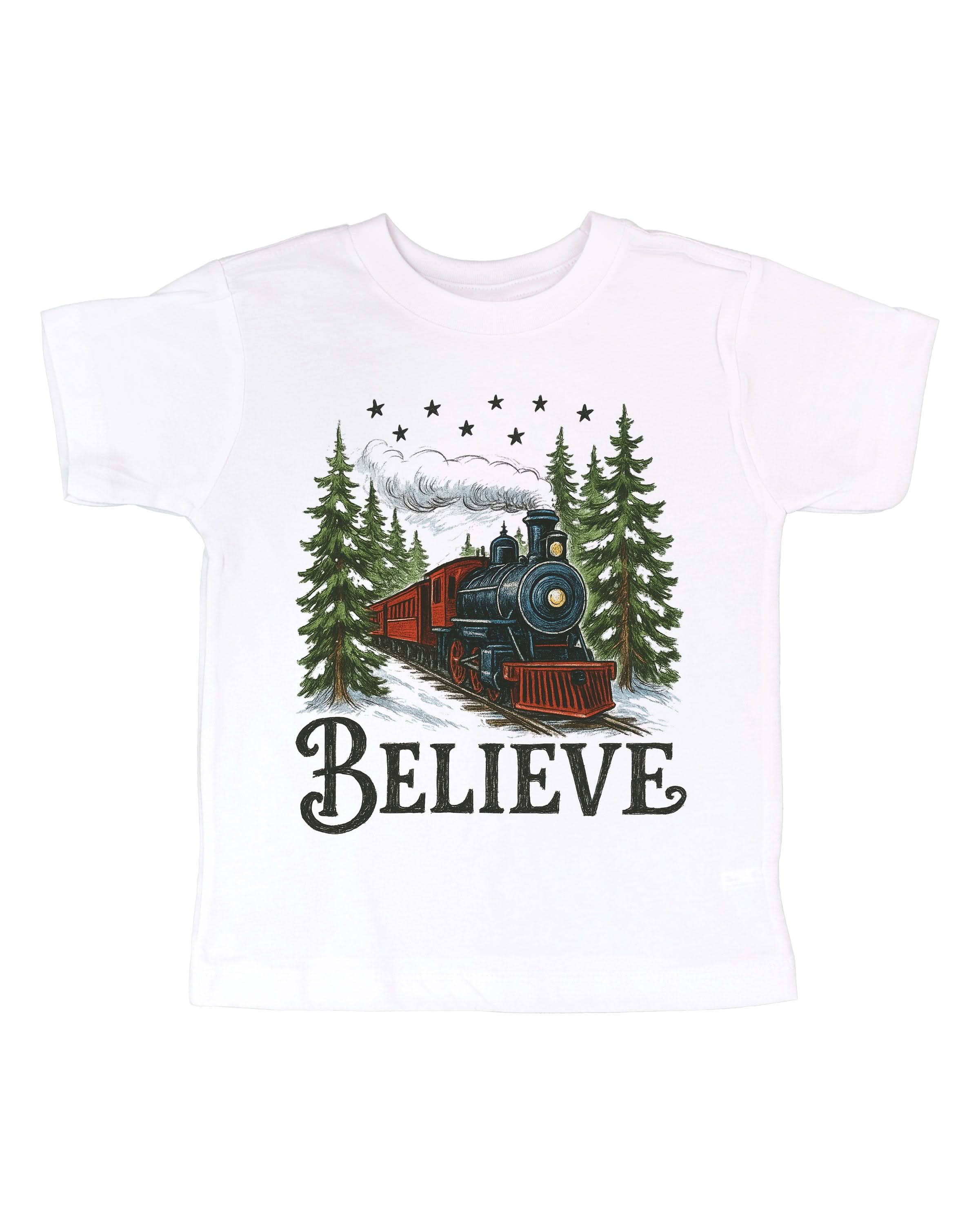 Child tee in white with winter train and 'Believe' on chest, shown on flat lay – Little Mama Shirt Shop