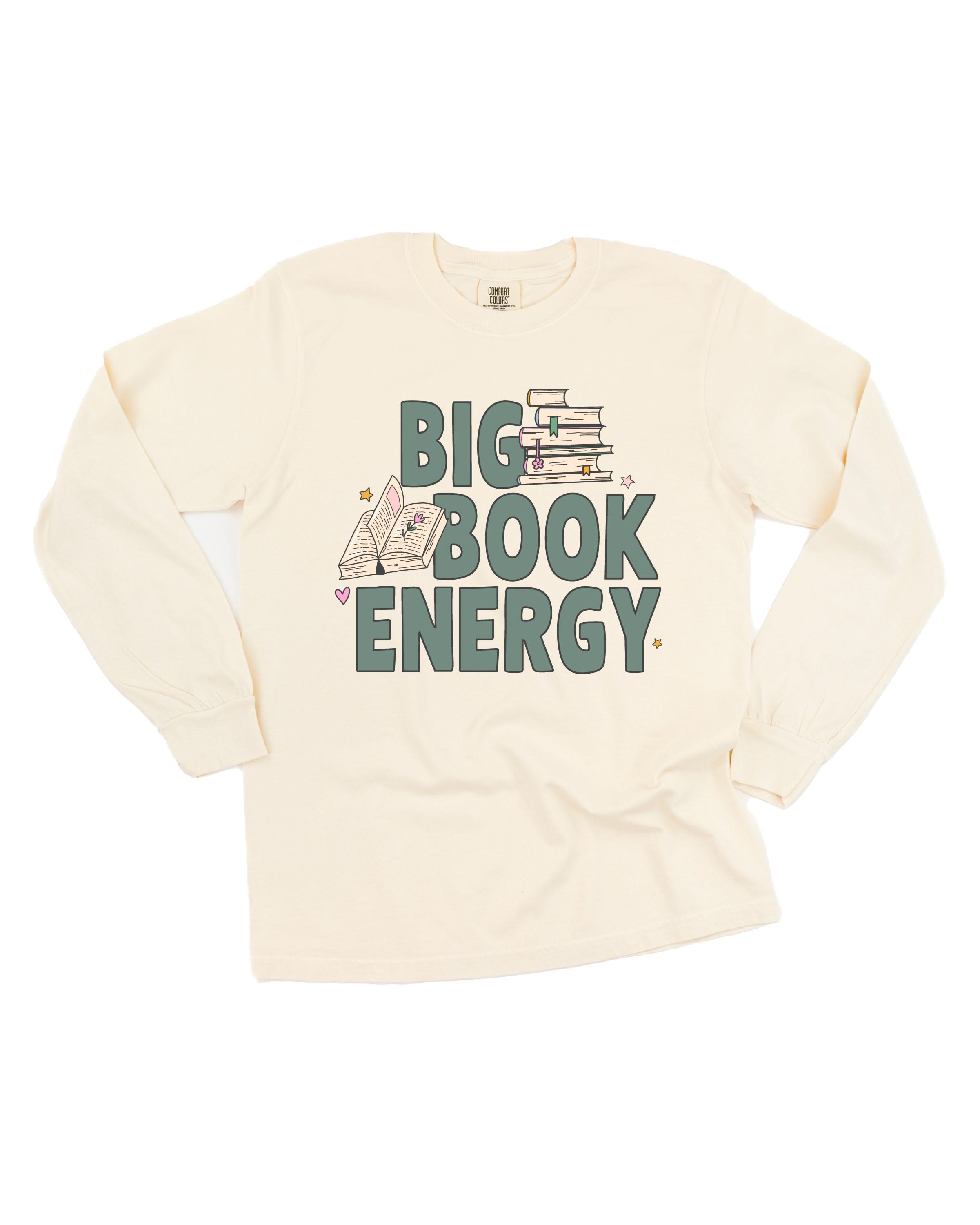 Comfort colors tee in ivory with 'Big Book Energy' graphic, shown on flat lay – Little Mama Shirt Shop
