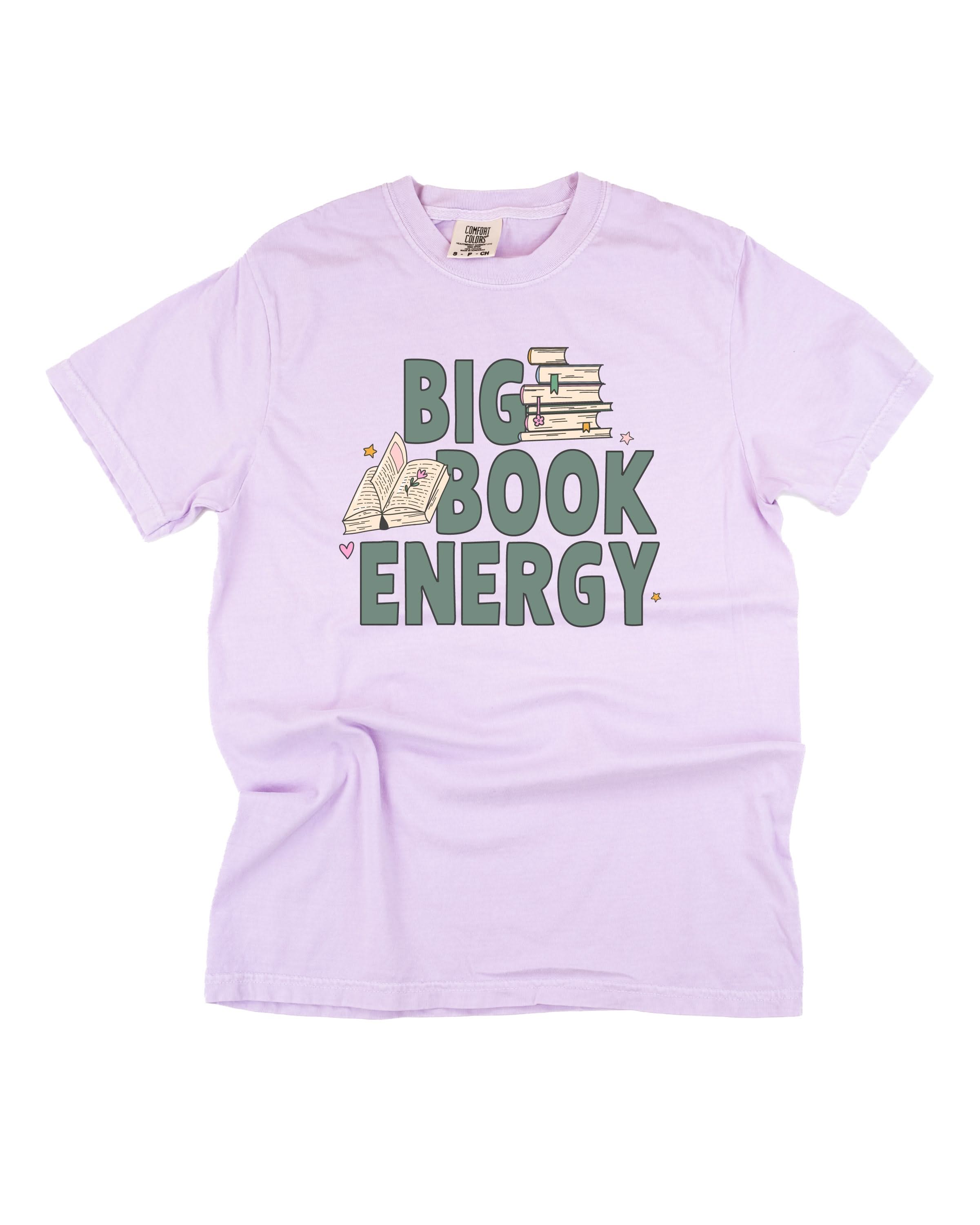 Comfort colors tee in orchid with 'Big Book Energy' graphic, shown on flat lay – Little Mama Shirt Shop