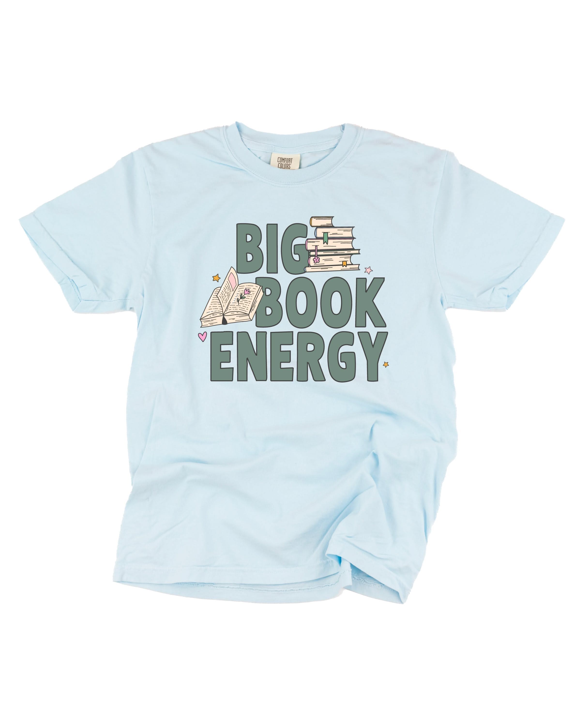 Comfort colors tee in chambray with 'Big Book Energy' graphic, shown on flat lay – Little Mama Shirt Shop