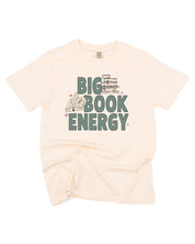 Comfort colors tee in ivory with 'Big Book Energy' graphic, shown on flat lay – Little Mama Shirt Shop