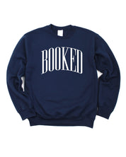 Basic fleece in navy with 'BOOKED' graphic on chest, shown on flat lay – Little Mama Shirt Shop