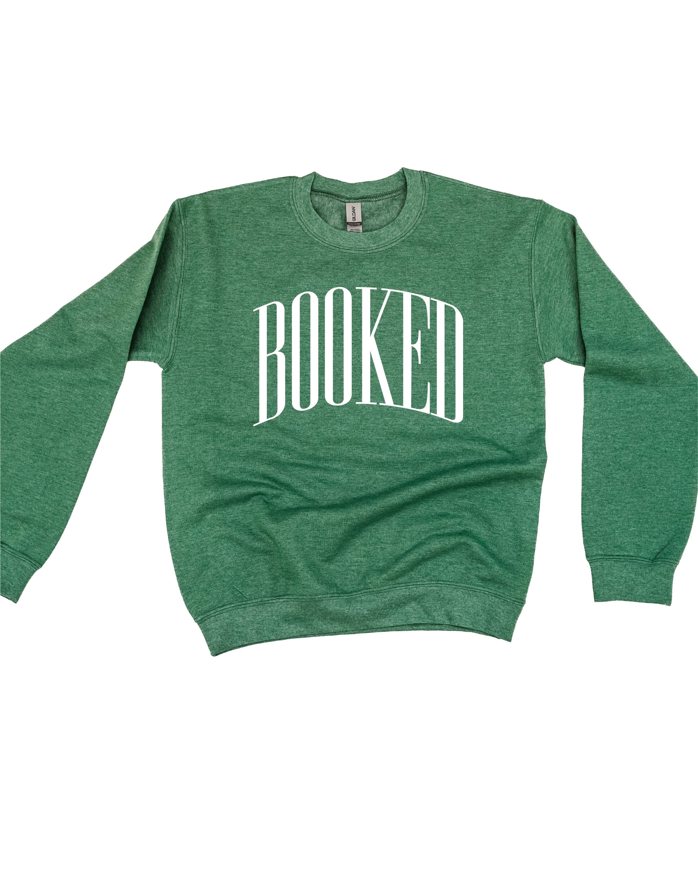 Basic fleece in forest with 'BOOKED' graphic on chest, shown on flat lay – Little Mama Shirt Shop