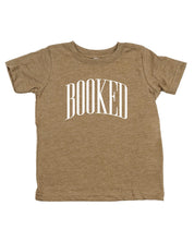 Child tee in coyote brown with 'BOOKED' graphic on chest, shown on flat lay – Little Mama Shirt Shop