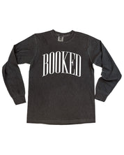 Long sleeve comfort colors tee in pepper with 'BOOKED' graphic on chest, shown on flat lay – Little Mama Shirt Shop