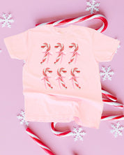 Comfort Colors Tee in blossom with 6 candy canes on chest, shown on flat lay – Little Mama Shirt Shop