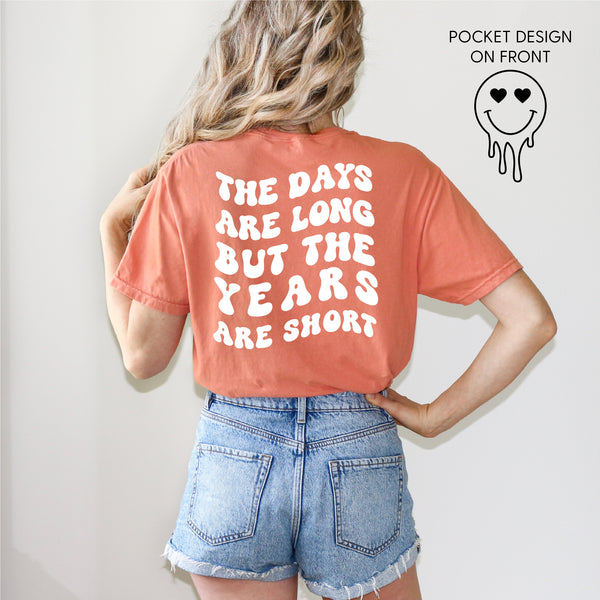 Melting Motherhood - THE DAYS ARE LONG BUT THE YEARS ARE SHORT - (w/ Melty Heart Eyes) - SHORT SLEEVE COMFORT COLORS TEE