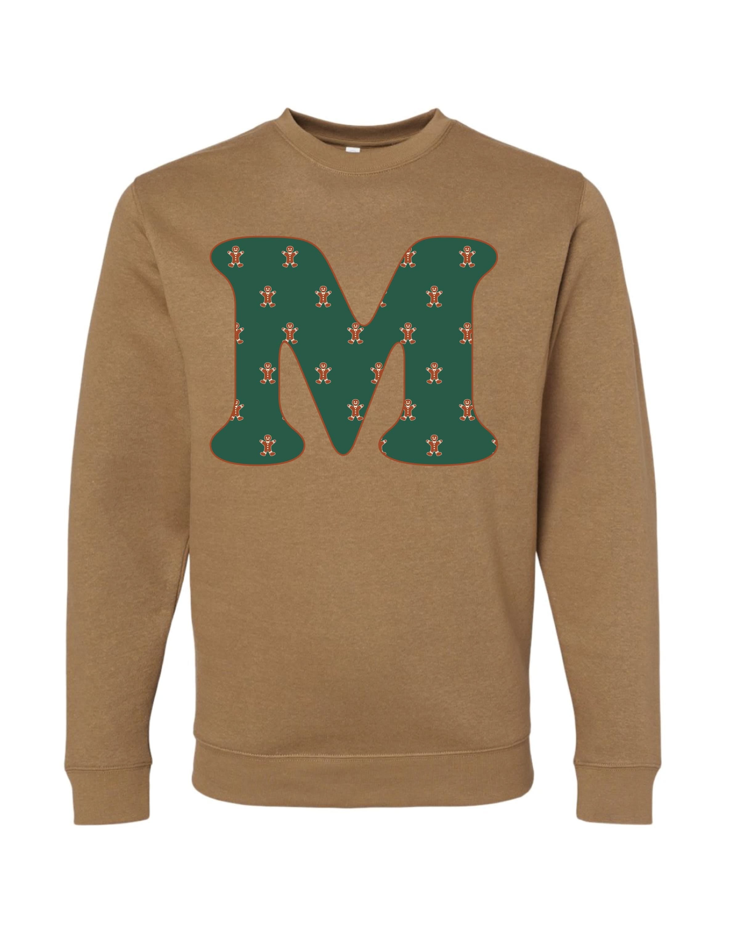 Adult Sweaters in coyote brown with Christmas patterned gingerbread men with initial M on front, shown on flat lay – Little Mama Shirt Shop