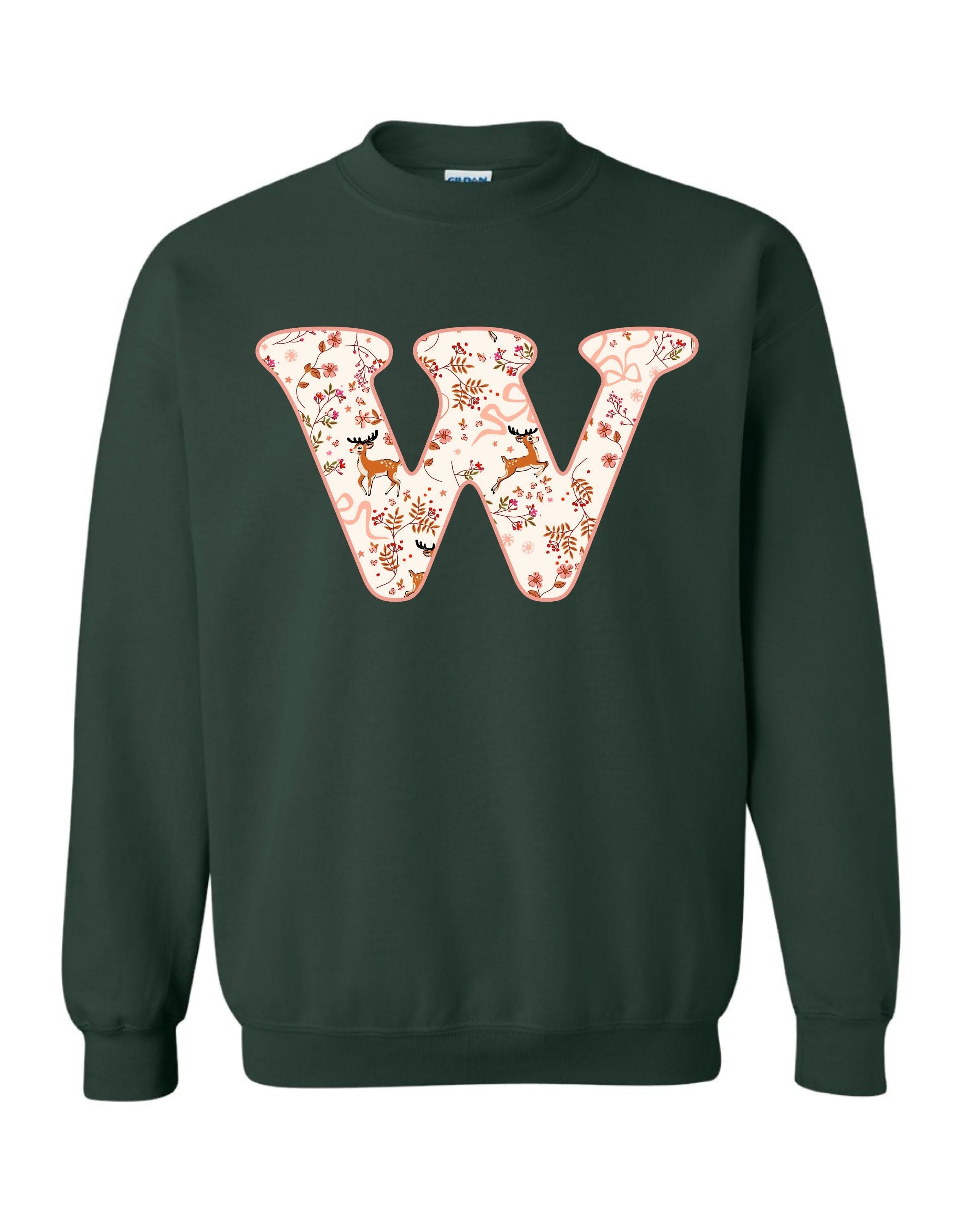 Adult Sweaters in forest with Christmas patterned reindeer with initial W on front, shown on flat lay – Little Mama Shirt Shop