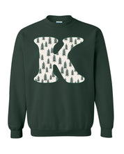 Adult Sweaters in forest with Christmas patterned trees with  initial K on front, shown on flat lay – Little Mama Shirt Shop
