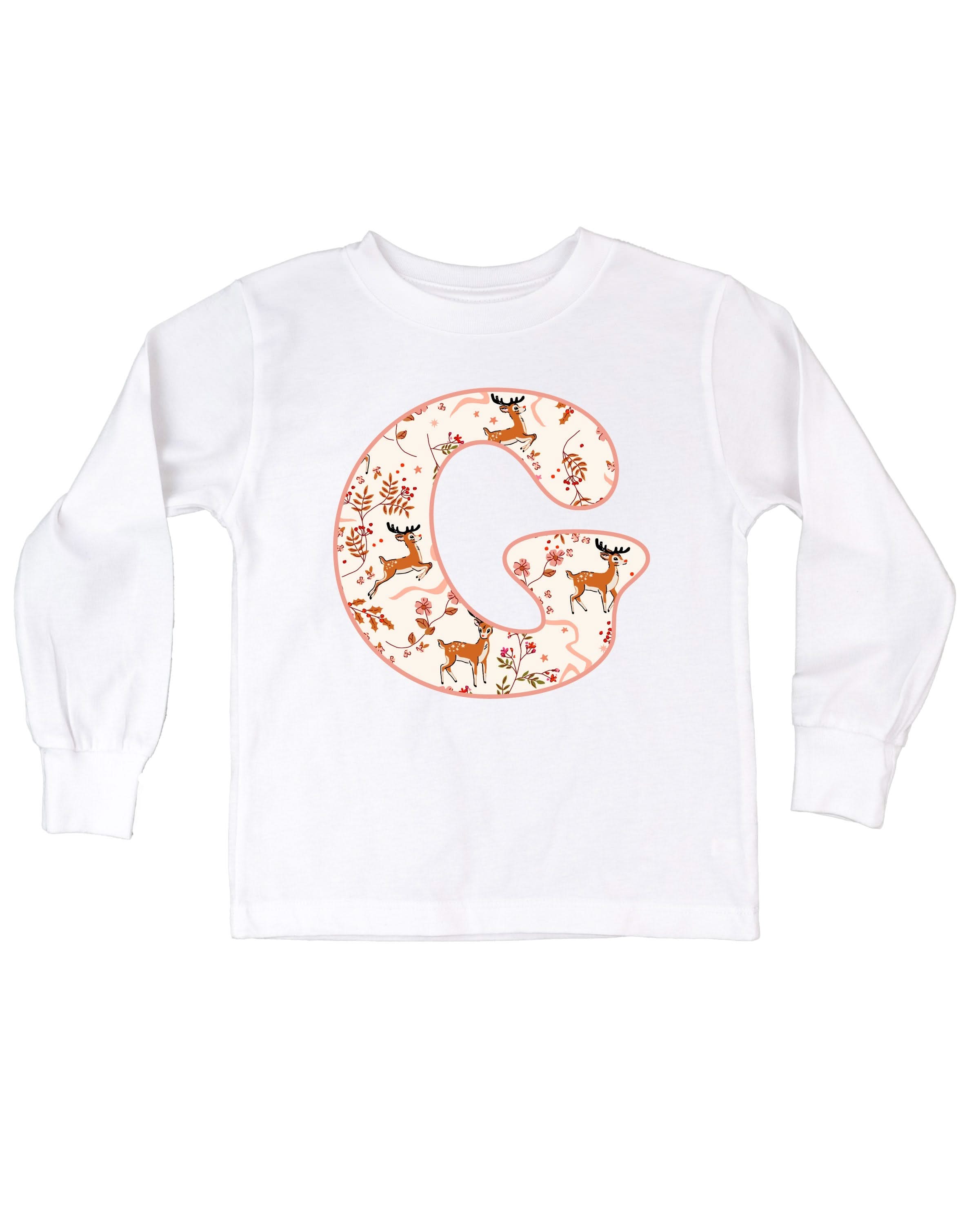 Child long sleeve in white with Christmas patterned reindeer initial G on front, shown on flat lay – Little Mama Shirt Shop