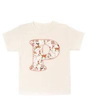 Child tee in natural with Christmas pattern reindeer with initial P on front, shown on flat lay – Little Mama Shirt Shop