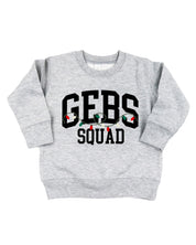 kids basic fleece in gray with personalized last name printed on front with Christmas lights under, shown on flat lay – Little Mama Shirt Shop