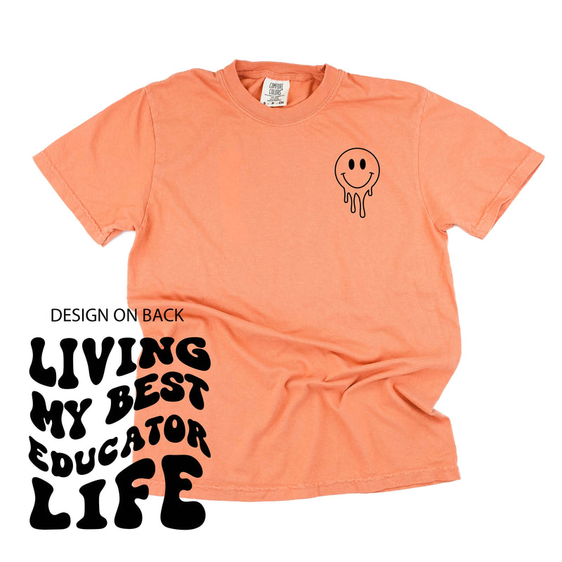 Living My Best Educator Life (w/ Pocket Melty Smiley) - SHORT SLEEVE COMFORT COLORS TEE