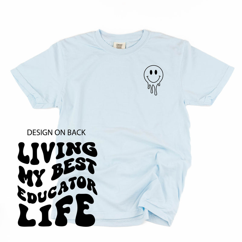 Living My Best Educator Life (w/ Pocket Melty Smiley) - SHORT SLEEVE COMFORT COLORS TEE