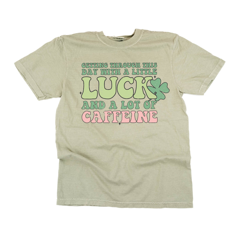 comfort_colors_short_sleeves_getting_through_this_day_with_caffeine_and_luck_little_mama_shirt_shop