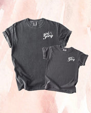 Adult and child tees in pepper with "girl gang" design on front chest, shown on flat lay - Little Mama Shirt Shop