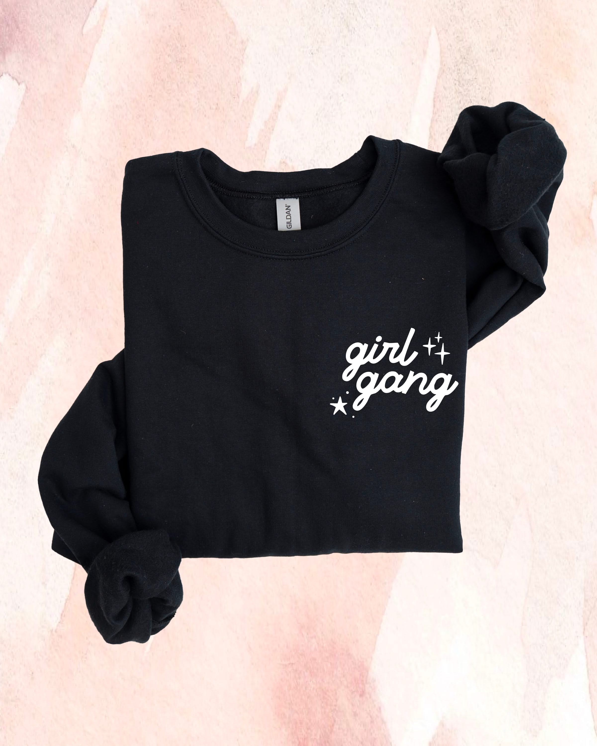 Adult sweater in black with "girl gang" design on front chest, shown on flat lay - Little Mama Shirt Shop
