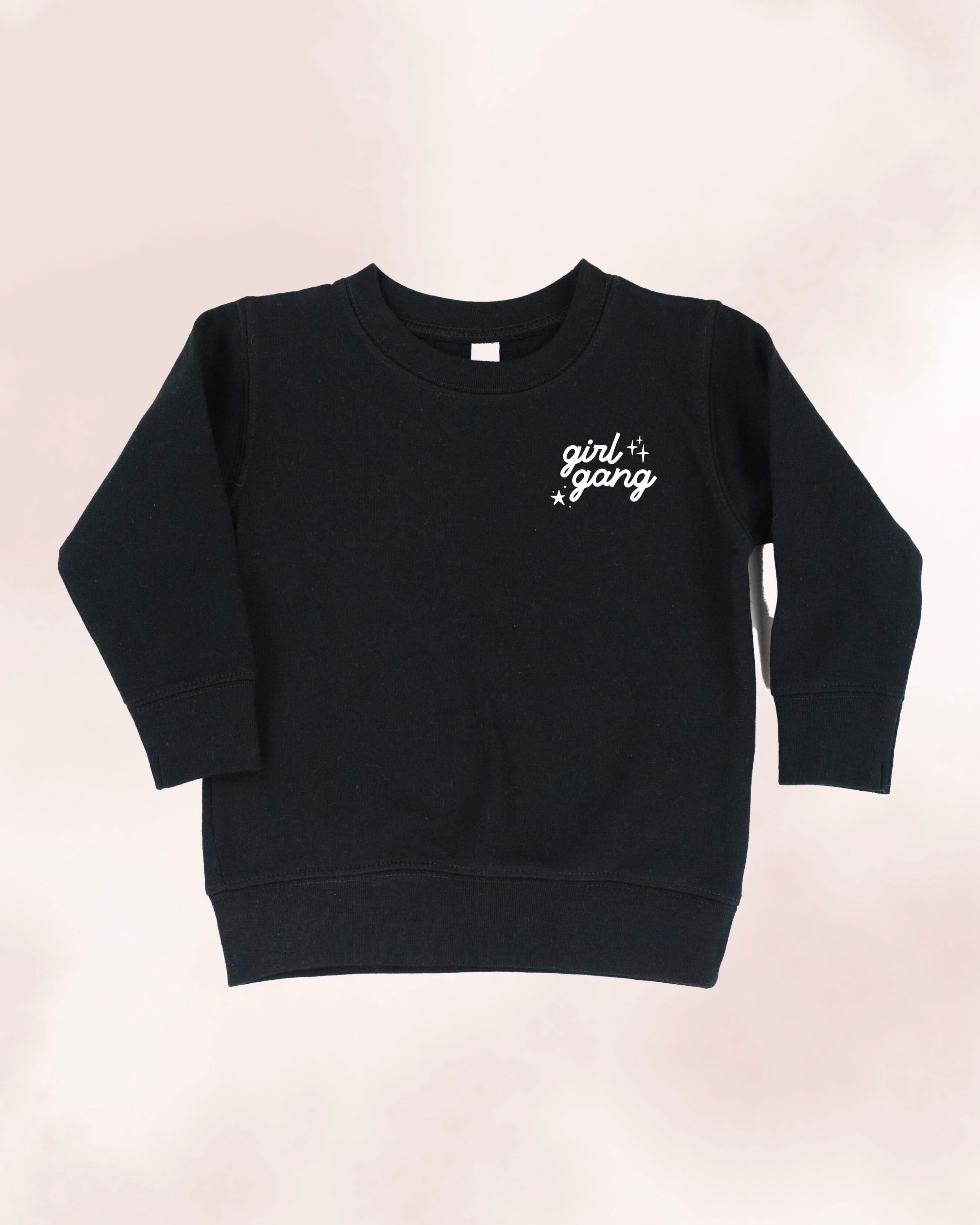 Child sweater in black with "girl gang" design on front chest, shown on flat lay - Little Mama Shirt Shop