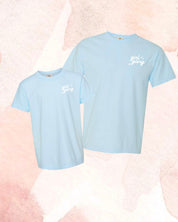 Adult and child tees in chambray with "girl gang" design on front chest, shown on flat lay - Little Mama Shirt Shop