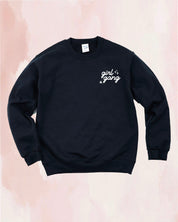 Adult sweater in black with "girl gang" design on front chest, shown on flat lay - Little Mama Shirt Shop