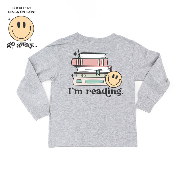 Go Away... Pocket Design on Front w/ I’m Reading. Full Design on Back - Long Sleeve Child Shirt