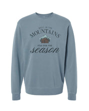 Adult sweater in slate with'meet in the mountains, stay for the season' design on front, shown on model – Little Mama Shirt Shop