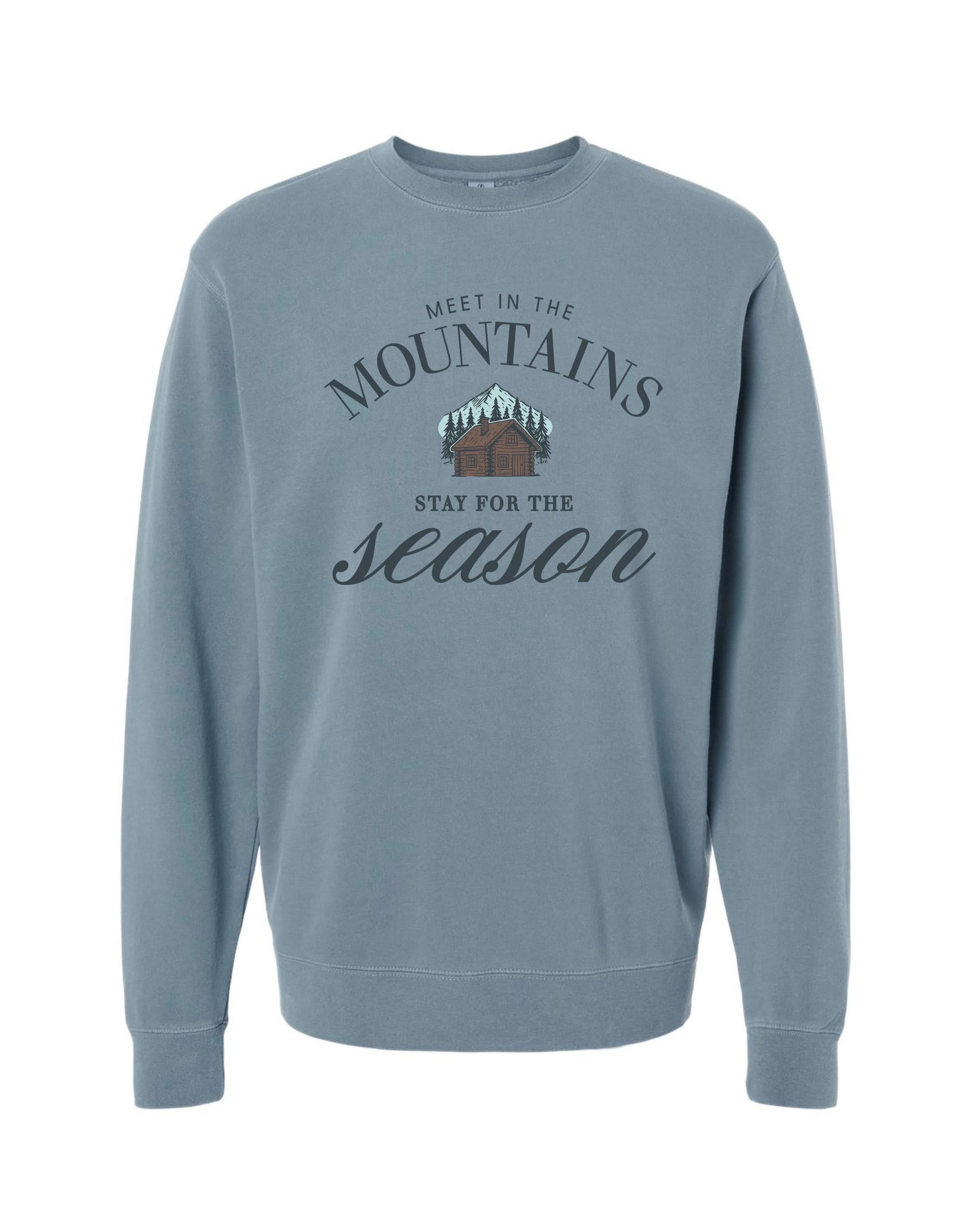 Adult sweater in slate with'meet in the mountains, stay for the season' design on front, shown on model – Little Mama Shirt Shop