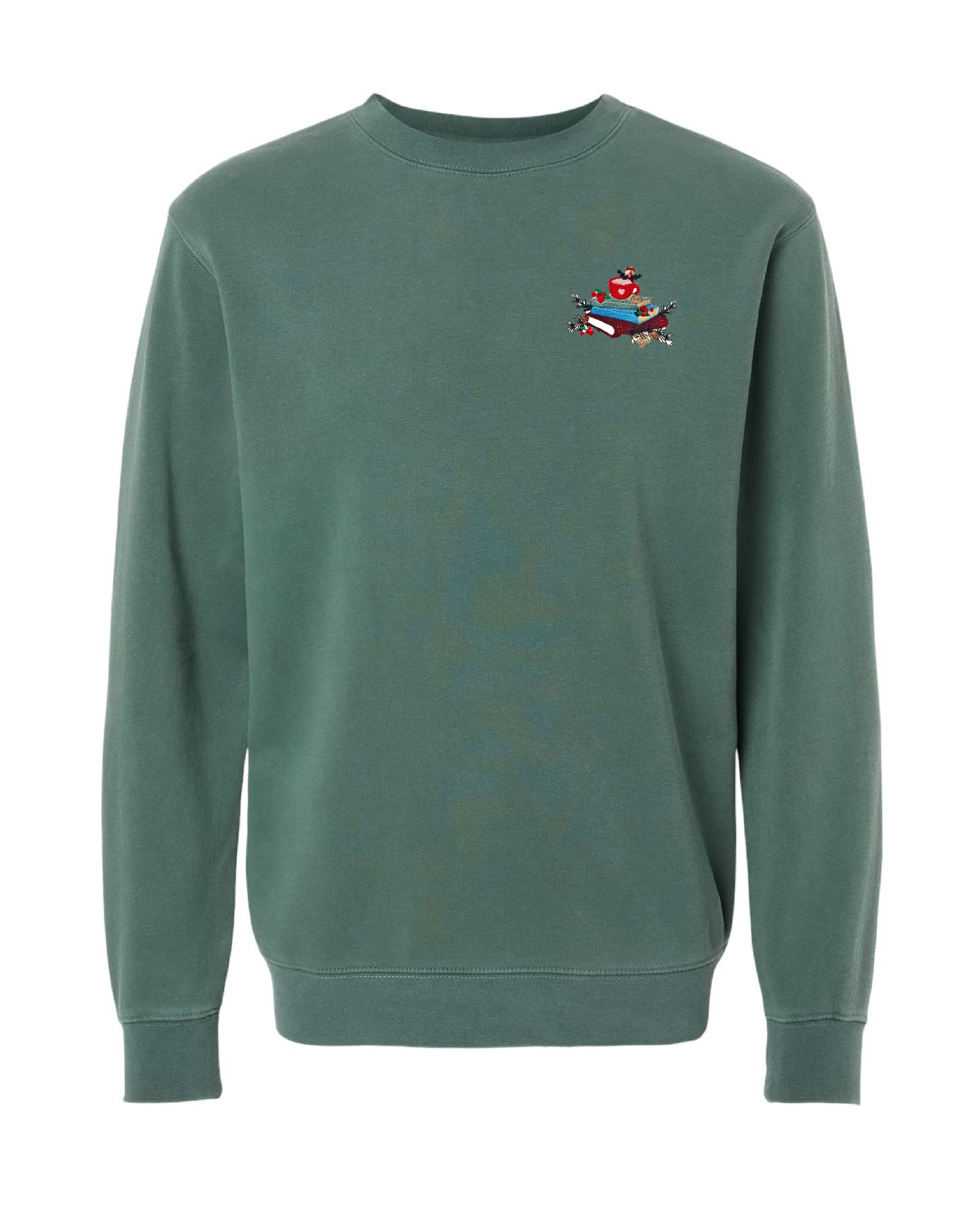 crewneck in alpine green with embroidered stack of books on front, shown on flat lay – Little Mama Shirt Shop