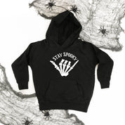 hoodies_child_stay_spooky_skeleton_hand_little_mama_shirt_shop