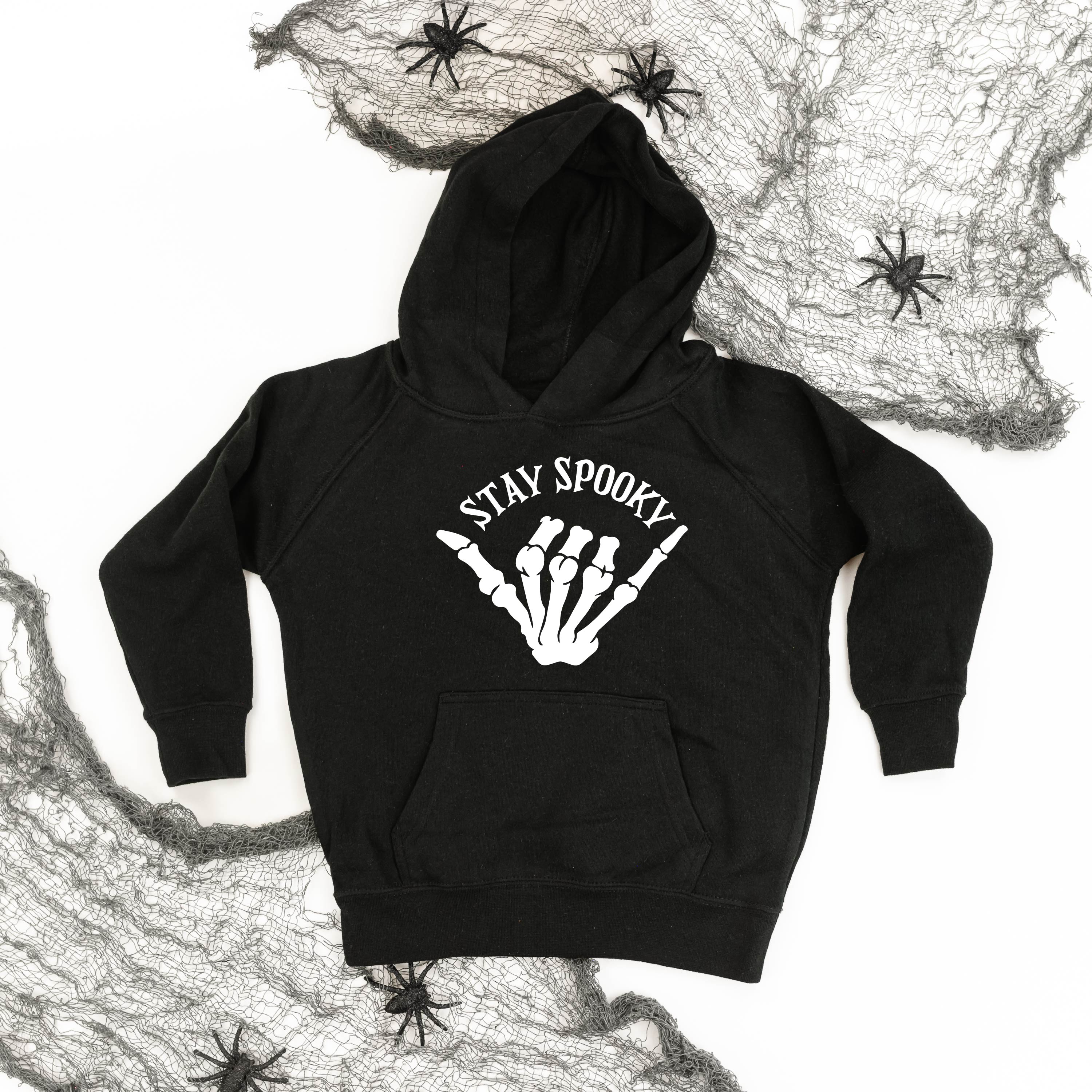 hoodies_child_stay_spooky_skeleton_hand_little_mama_shirt_shop