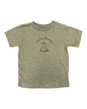 Child tee in olive with 'Hunny Bunny' text and little bunny outline on front, seen on flat lay - Little Mama Shirt Shop