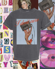 Child tee with "I Don't Care" retro cassette on front and "JK I Actually Do" text on sleeve, shown on flat lay  – Little Mama Shirt Shop