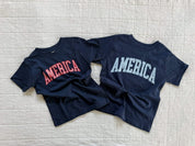 Kids AMERICA shirts in red and blue with gingham print, a simple matching option for siblings