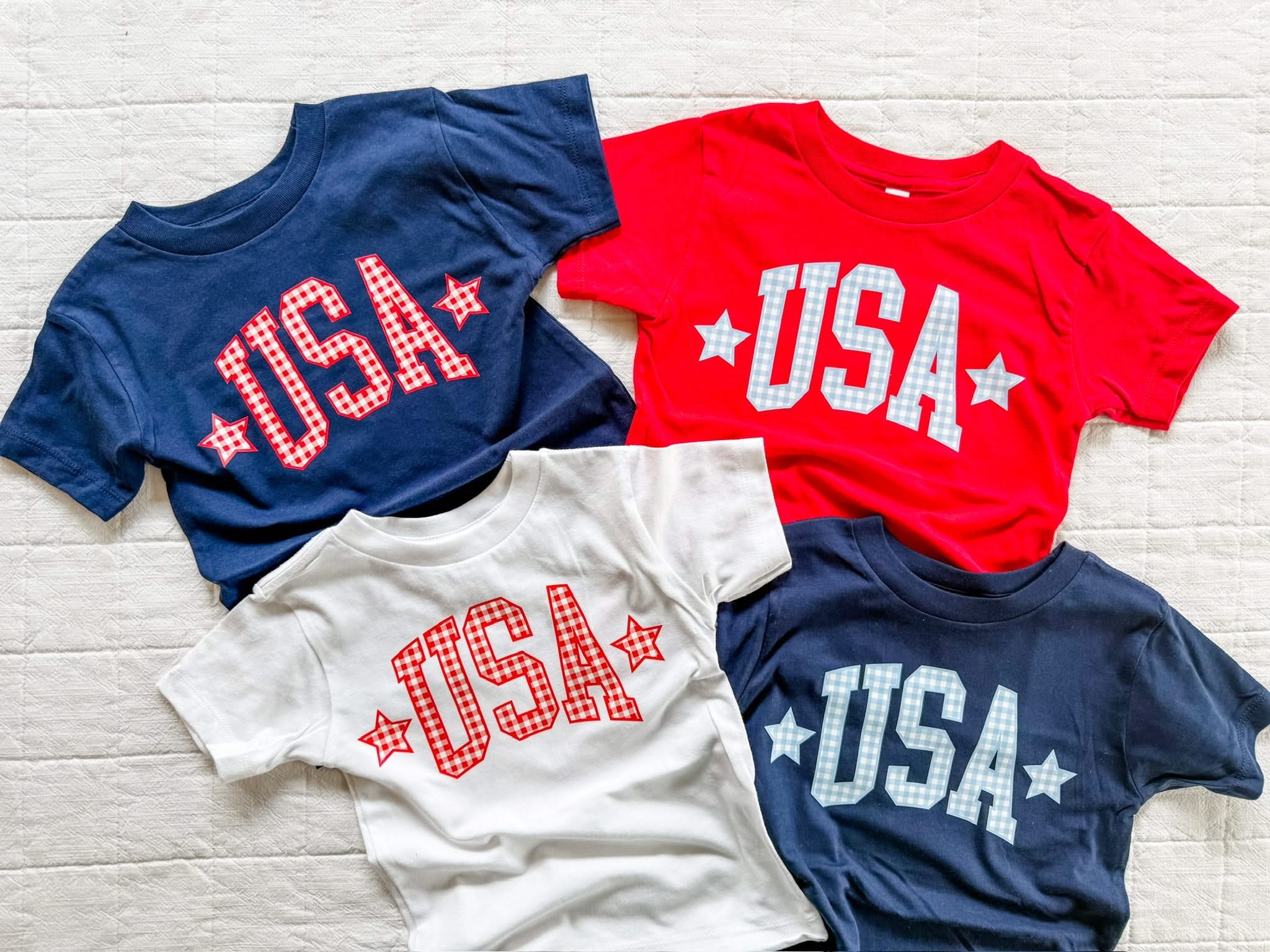 Kids USA shirts in red, white, and blue with gingham lettering, classic 4th of July outfits for children