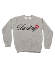 Adult gray sweater with "Darling" script and lipstick kiss design, shown on flat lay  – Little Mama Shirt Shop