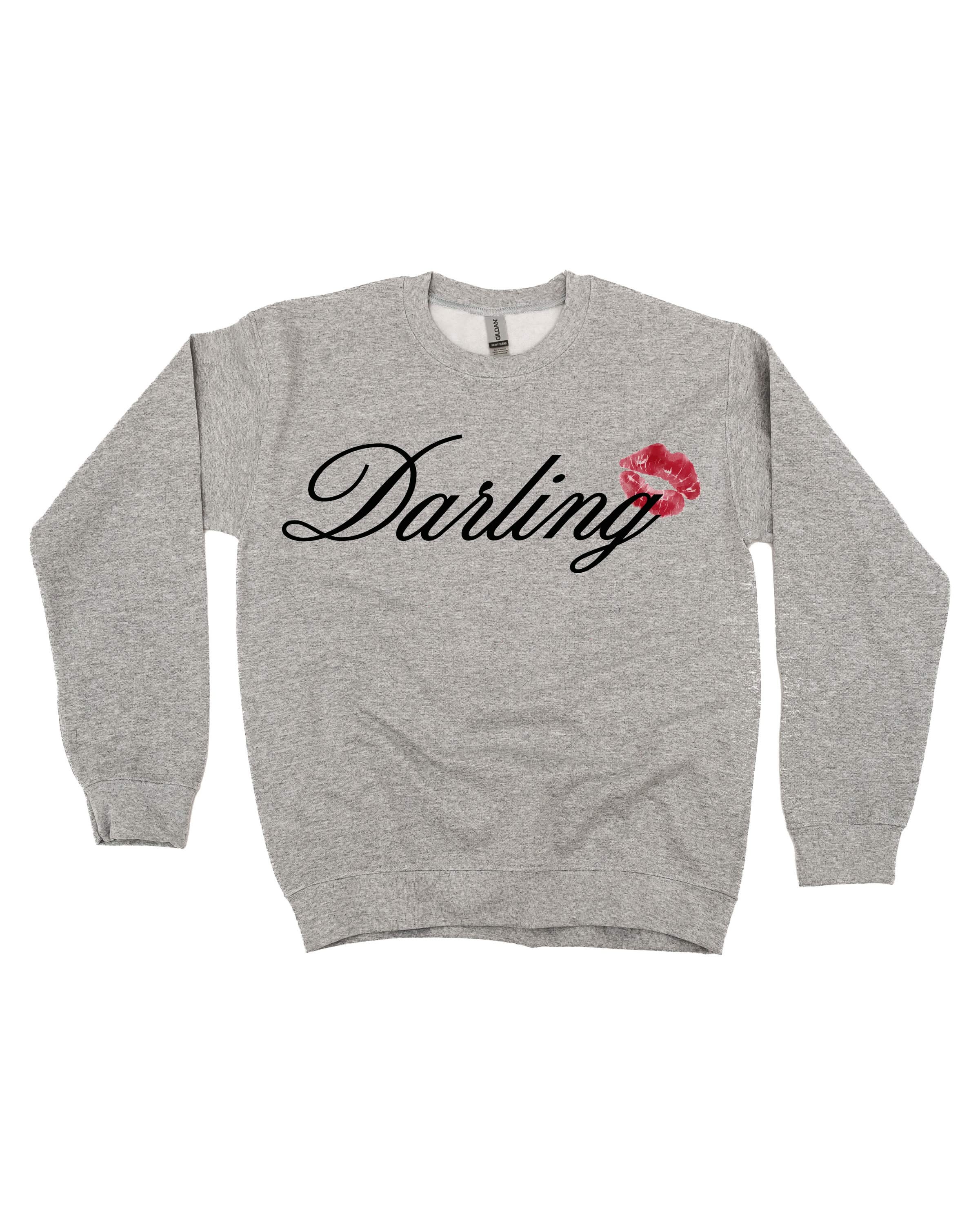 Adult gray sweater with "Darling" script and lipstick kiss design, shown on flat lay  – Little Mama Shirt Shop