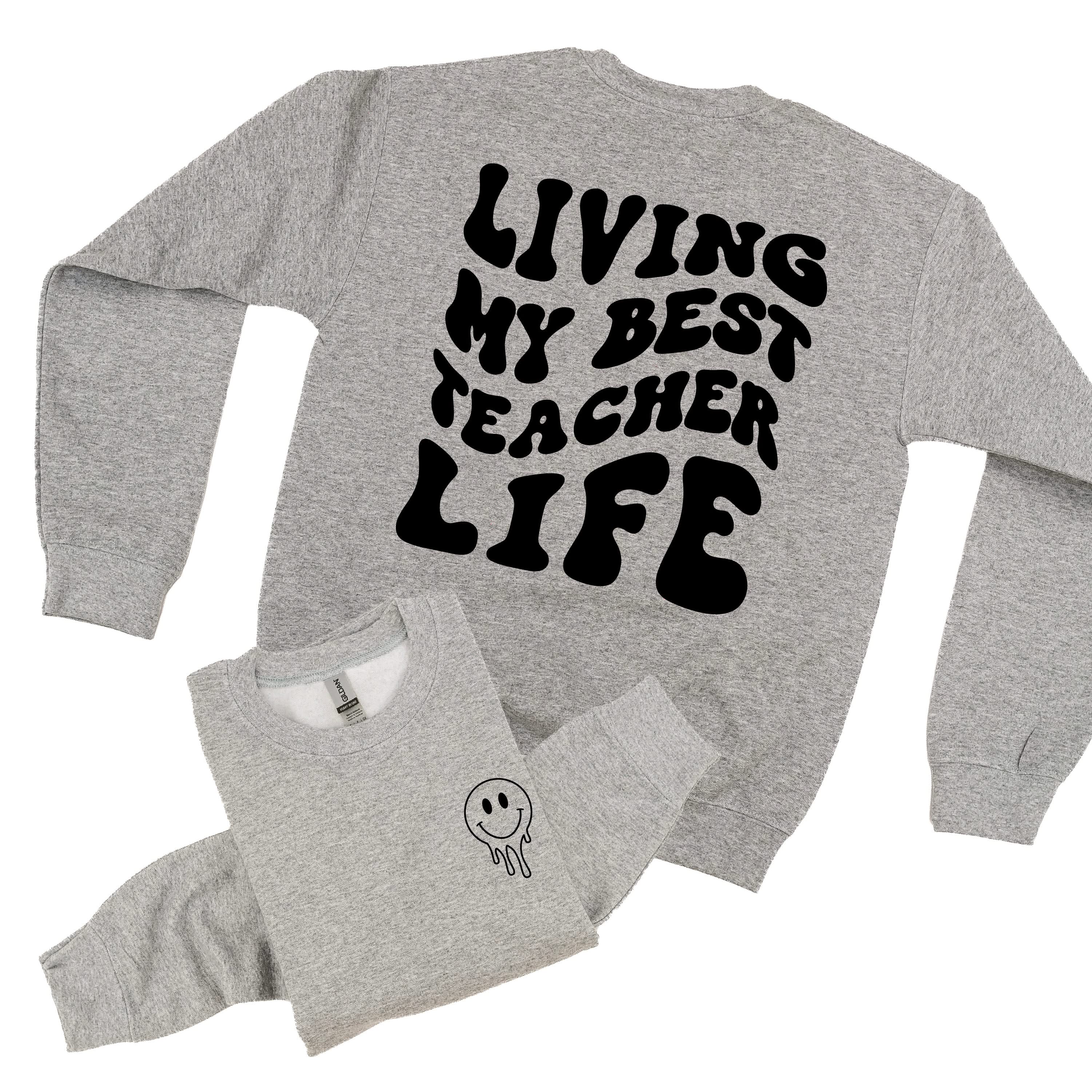 Living My Best Teacher Life - Melty Smiley (pf & b) - BASIC Fleece Little Mama Shirt Shop LLC